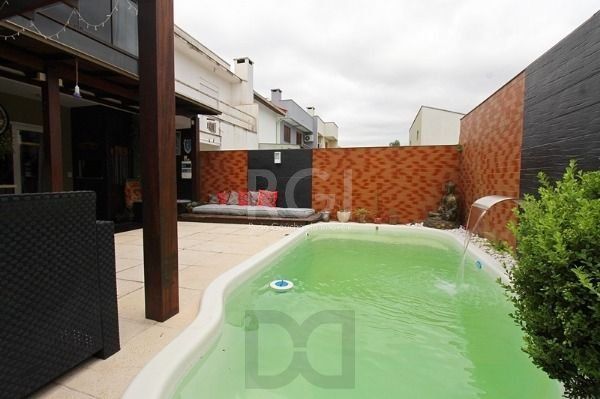 Casa em Porto Alegre, no bairro Hípica, com 3 dormitório(s), e 3 banheiros, à venda. — foto 18