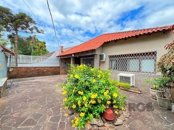 Casa em Porto Alegre, no bairro Guarujá, com 5 dormitório(s), e 5 banheiros, à venda. — foto 38