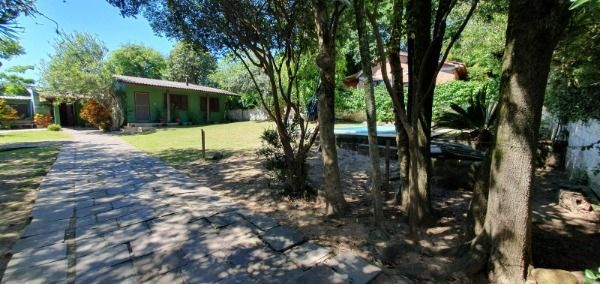 Casa em Porto Alegre, no bairro Ponta Grossa, com 3 dormitório(s), e 3 banheiros, à venda. — foto 1