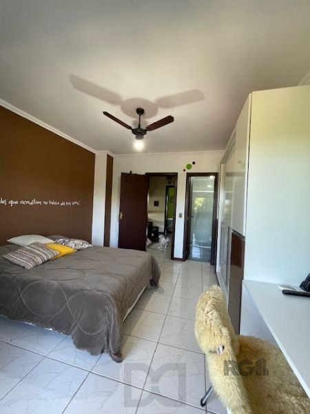 Casa em Porto Alegre, no bairro Hípica, com 3 dormitório(s), e 3 banheiros, à venda. — foto 10