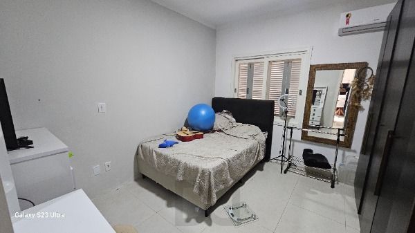 Casa em Porto Alegre, no bairro Hípica, com 3 dormitório(s), e 3 banheiros, à venda. — foto 11