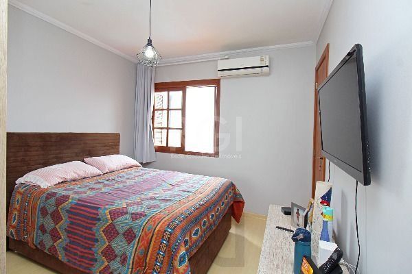 Casa em Porto Alegre, no bairro Hípica, com 3 dormitório(s), e 3 banheiros, à venda. — foto 33