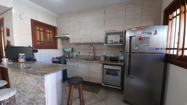 Casa em Porto Alegre, no bairro Espírito Santo, com 3 dormitório(s), e 3 banheiros, à venda. — foto 6