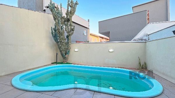 Casa em Porto Alegre, no bairro Hípica, com 3 dormitório(s), e 3 banheiros, à venda. — foto 24