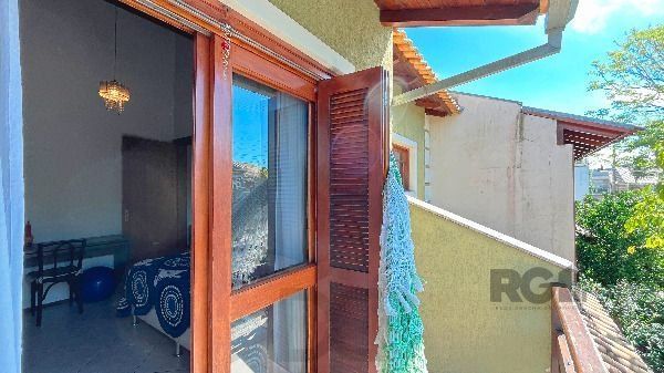 Casa em Porto Alegre, no bairro Hípica, com 3 dormitório(s), e 2 banheiros, à venda. — foto 34