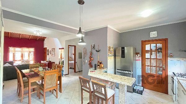 Casa em Porto Alegre, no bairro Hípica, com 3 dormitório(s), e 2 banheiros, à venda. — foto 12