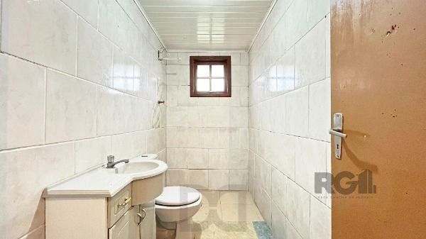 Casa em Porto Alegre, no bairro Guarujá, com 2 dormitório(s), e 2 banheiros, à venda. — foto 23