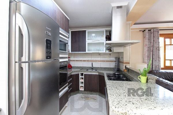 Casa em Porto Alegre, no bairro Belém Novo, com 3 dormitório(s), e 3 banheiros, à venda. — foto 26
