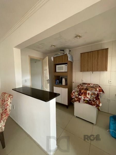 Casa em Porto Alegre, no bairro Hípica, com 2 dormitório(s), e 2 banheiros, à venda. — foto 4