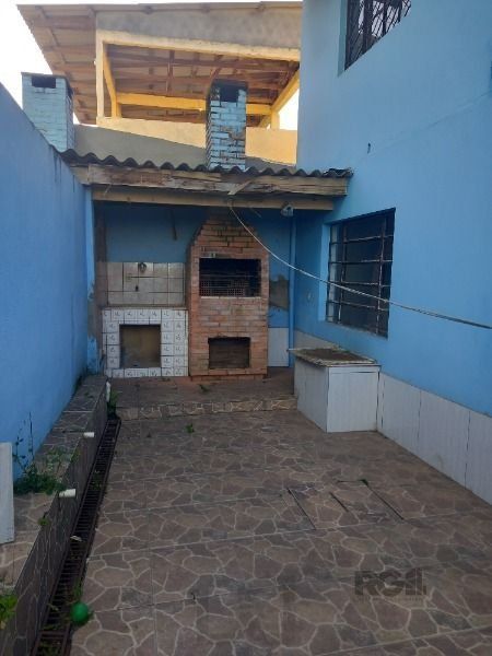Casa em Porto Alegre, no bairro Cavalhada, com 3 dormitório(s), e 3 banheiros, à venda. — foto 7