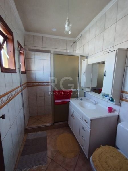 Casa em Porto Alegre, no bairro Hípica, com 3 dormitório(s), e 3 banheiros, à venda. — foto 26