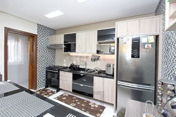 Casa em Porto Alegre, no bairro Hípica, com 3 dormitório(s), e 3 banheiros, à venda. — foto 12