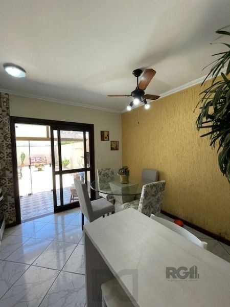 Casa em Porto Alegre, no bairro Hípica, com 3 dormitório(s), e 3 banheiros, à venda. — foto 7