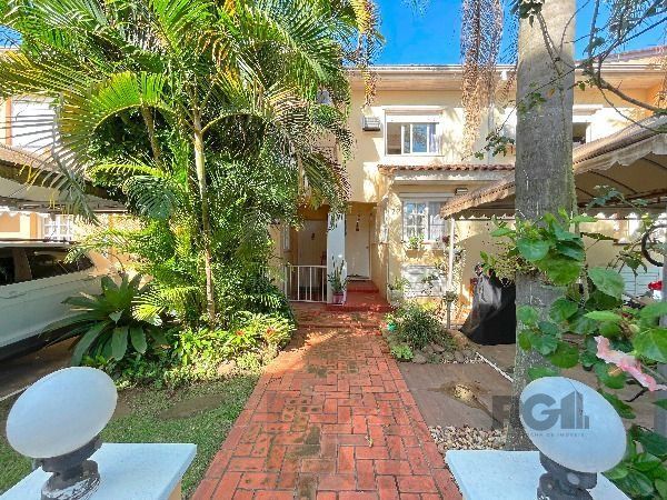 Casa Condomínio em Porto Alegre, no bairro Tristeza, com 3 dormitórios à venda. — foto 1