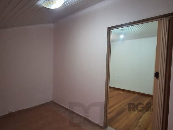 Casa em Porto Alegre, no bairro Vila Nova, com 4 dormitório(s), e 4 banheiros, à venda. — foto 25