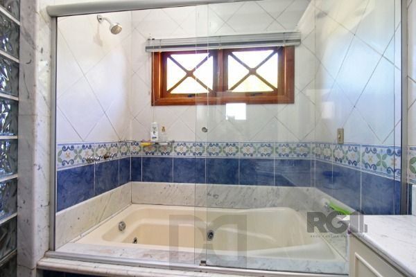 Casa em Porto Alegre, no bairro Ipanema, com 3 dormitório(s), e 3 banheiros, à venda. — foto 43