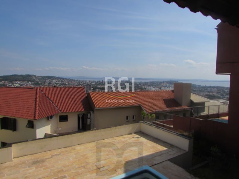 Casa Condominio para Venda - 383.4m², 5 dormitórios, sendo 2 suites, 3 vagas - Nonoai — foto 2