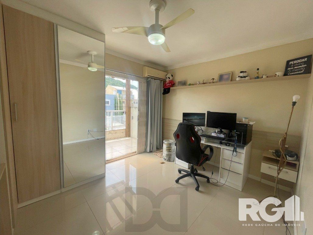 Bela casa três dormitórios localizada nos altos do bairro Guarujá — foto 27