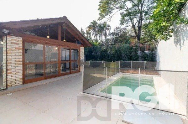 Ótima Residência com quatro dormitórios em Ipanema — foto 2