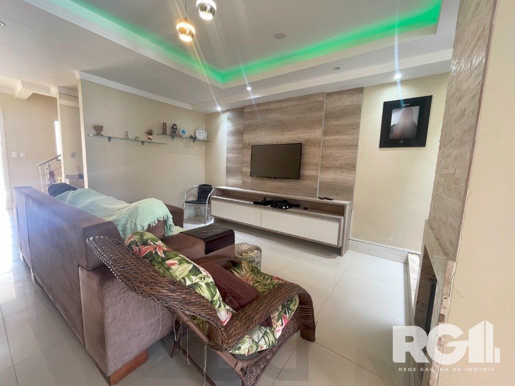Bela casa três dormitórios localizada nos altos do bairro Guarujá — foto 15