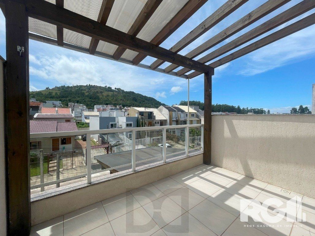 Bela casa três dormitórios localizada nos altos do bairro Guarujá — foto 38