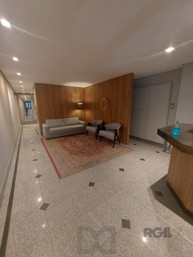 sala comercial, medindo 36,12 m² área privativa e 49,27 m² de área total, com 1 box coberto duplo, localizada no Moinhos de Vento — foto 26