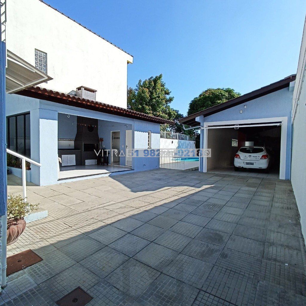 casa 04 dormitórios mais piscina e vagas cobertas — foto 1