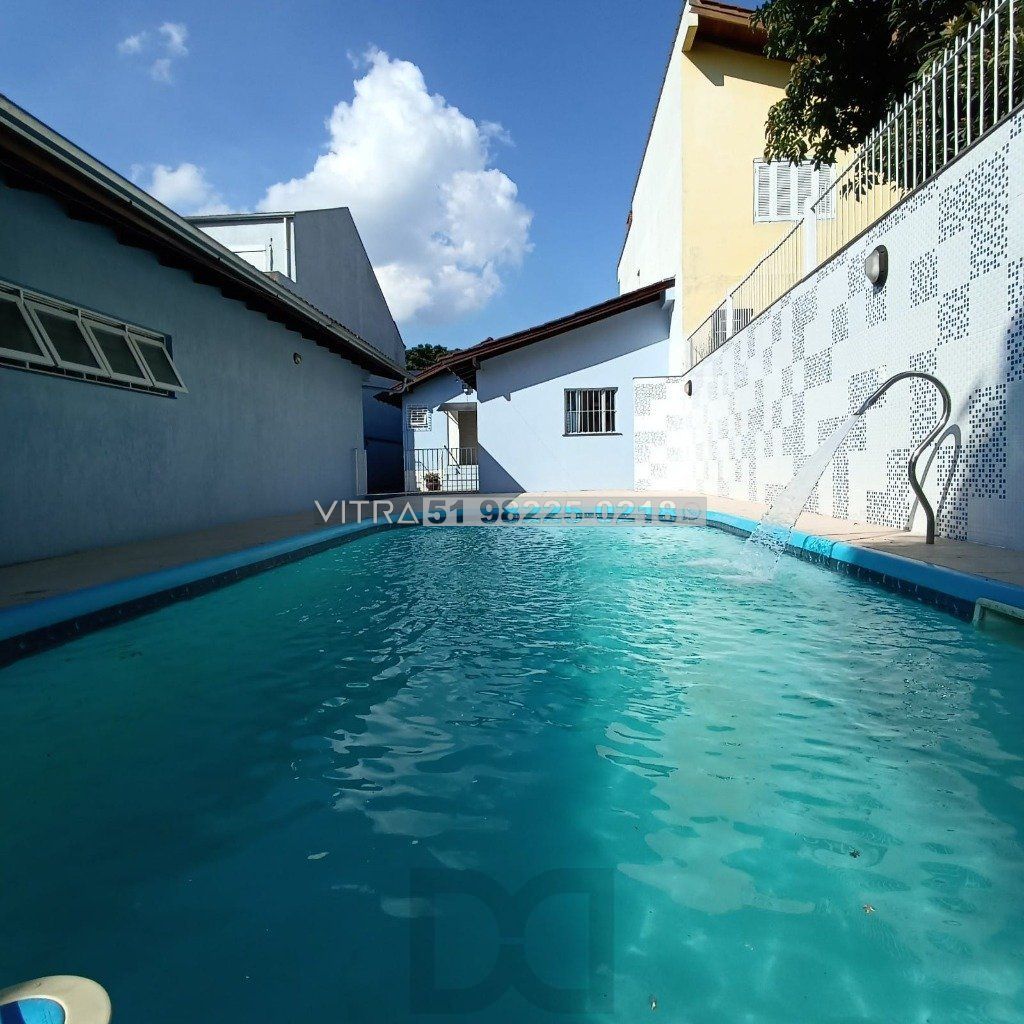 casa 04 dormitórios mais piscina e vagas cobertas — foto 2