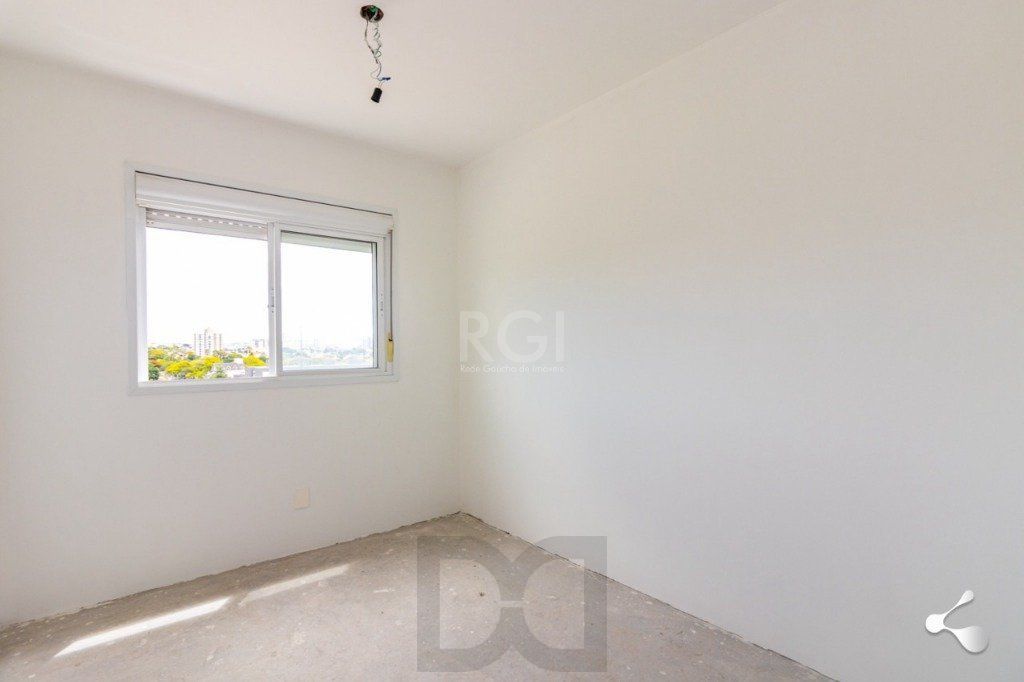 vende 03 dormitórios, living para dois ambientes, banheiro social, cozinha com churrasqueira e área de serviço com garagem — foto 2