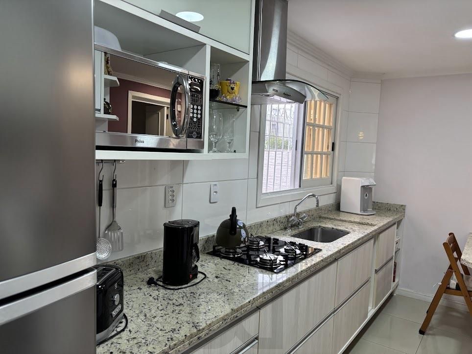 Casa em Condomínio com 3 Dormitórios, Suíte, Sótão e 2 Vagas — foto 28