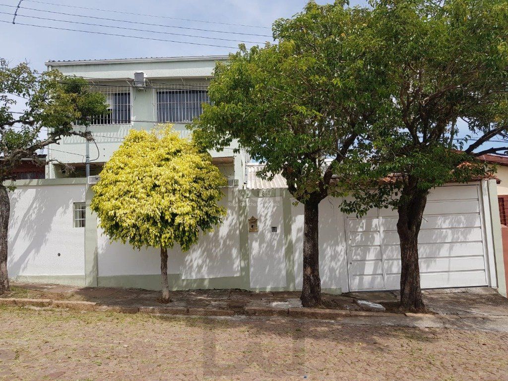 Casa para Venda - 259m², 4 dormitórios, sendo 1 suites, 4 vagas - Coronel Aparício Borges — foto 1