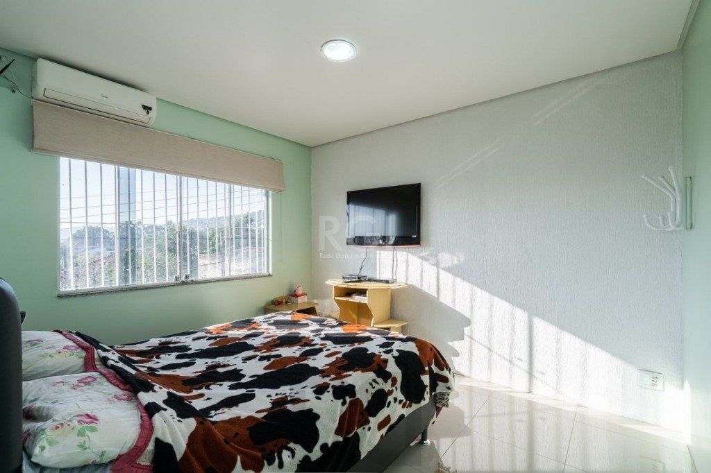 Casa para Venda - 259m², 4 dormitórios, sendo 1 suites, 4 vagas - Coronel Aparício Borges — foto 14