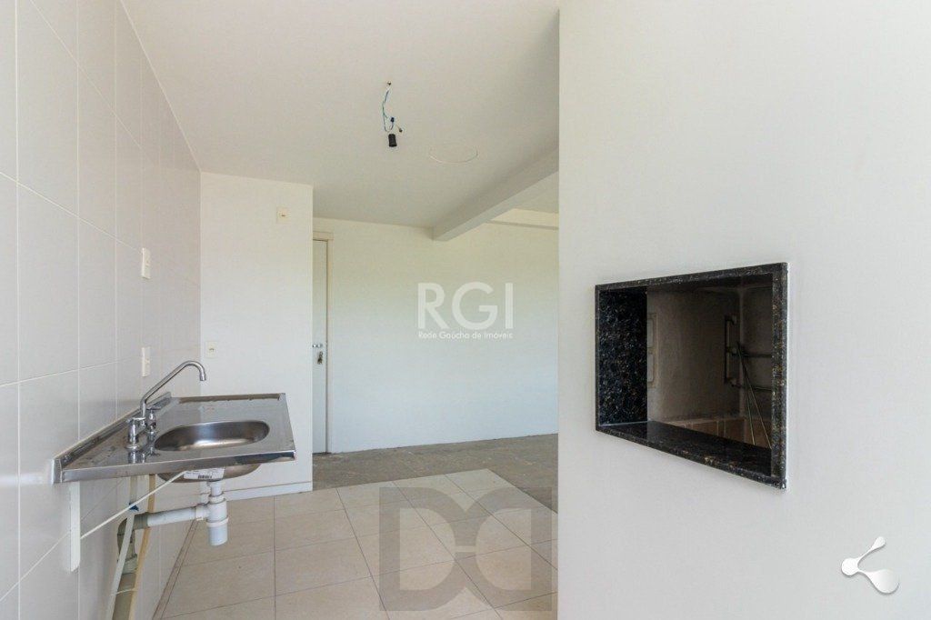 Vende apartamento, 03 dormitórios, living para dois ambientes, banheiro social, cozinha com churrasqueira e área de serviço e garagem. — foto 7