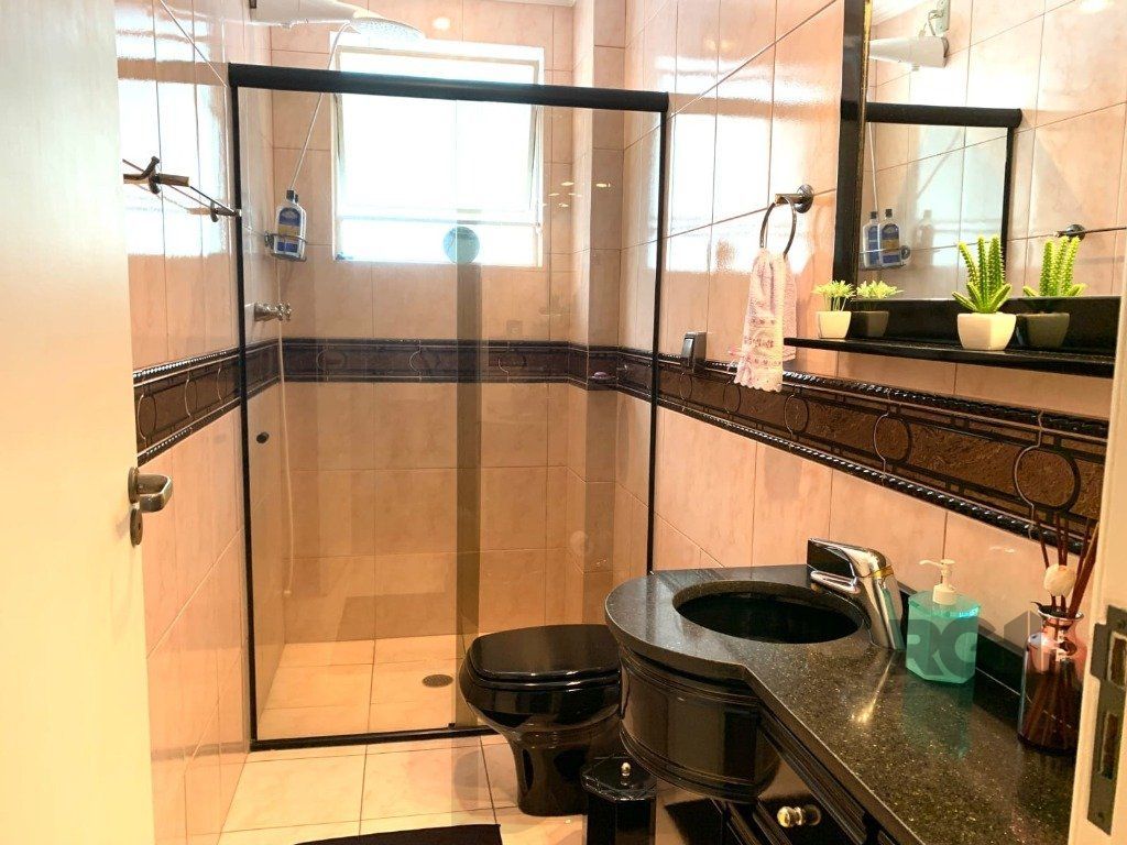 apartamento de 3 dormitórios , transformado em 2 com fácil reversão, Living para dois ambientes, com sacada fechada. — foto 6