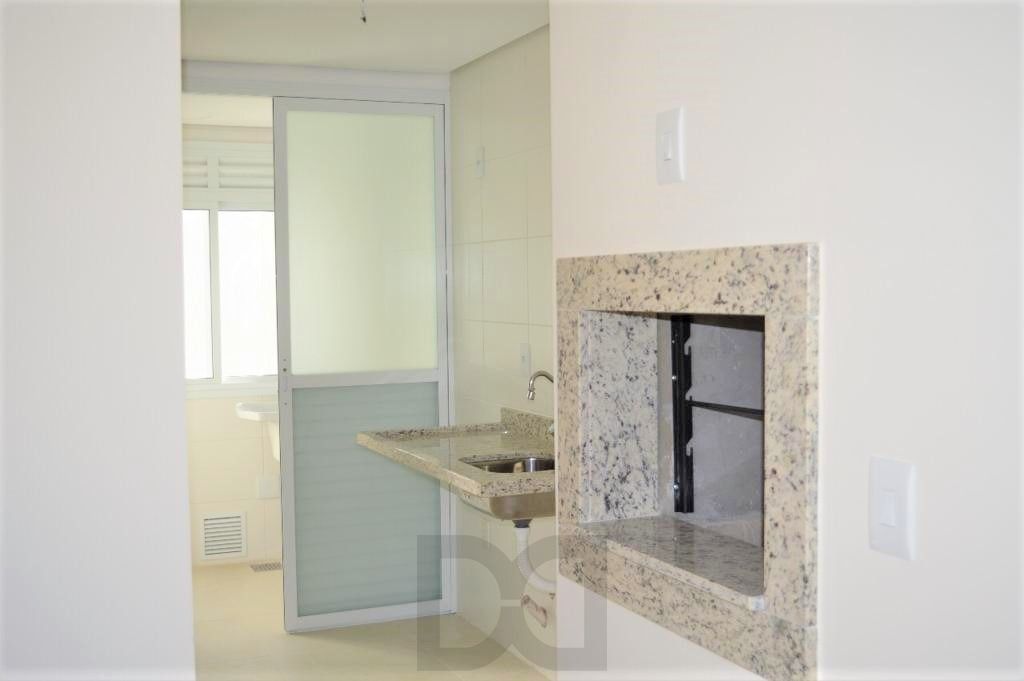 Apartamento 2 dormitórios com 1 suíte e box duplo de garagem no bairro Auxiliadora . — foto 9