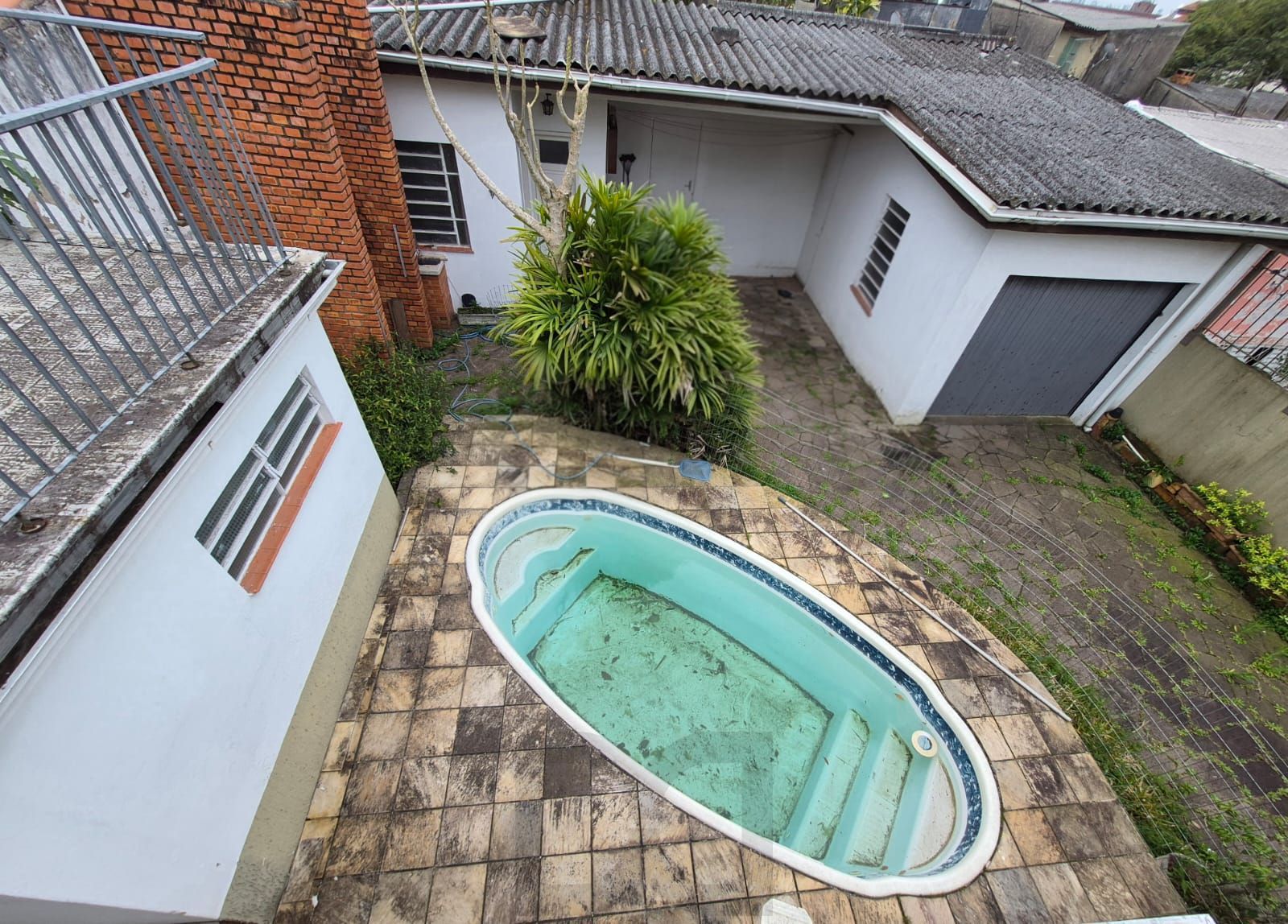 Casa 3 Dormitórios à venda com Piscina na Rua Carumbé - Porto Alegre - RS — foto 15