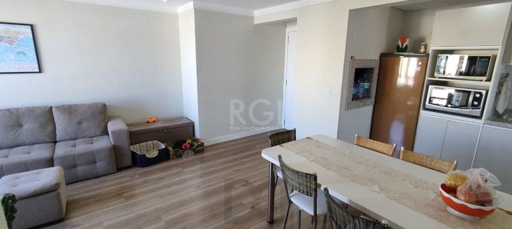 Excelente, amplo e ensolarado apartamento 3 dormitórios sendo 1 suíte, com living 2 ambientes, banheiro social, semimobiliado e com 2 vagas de garagem. — foto 13