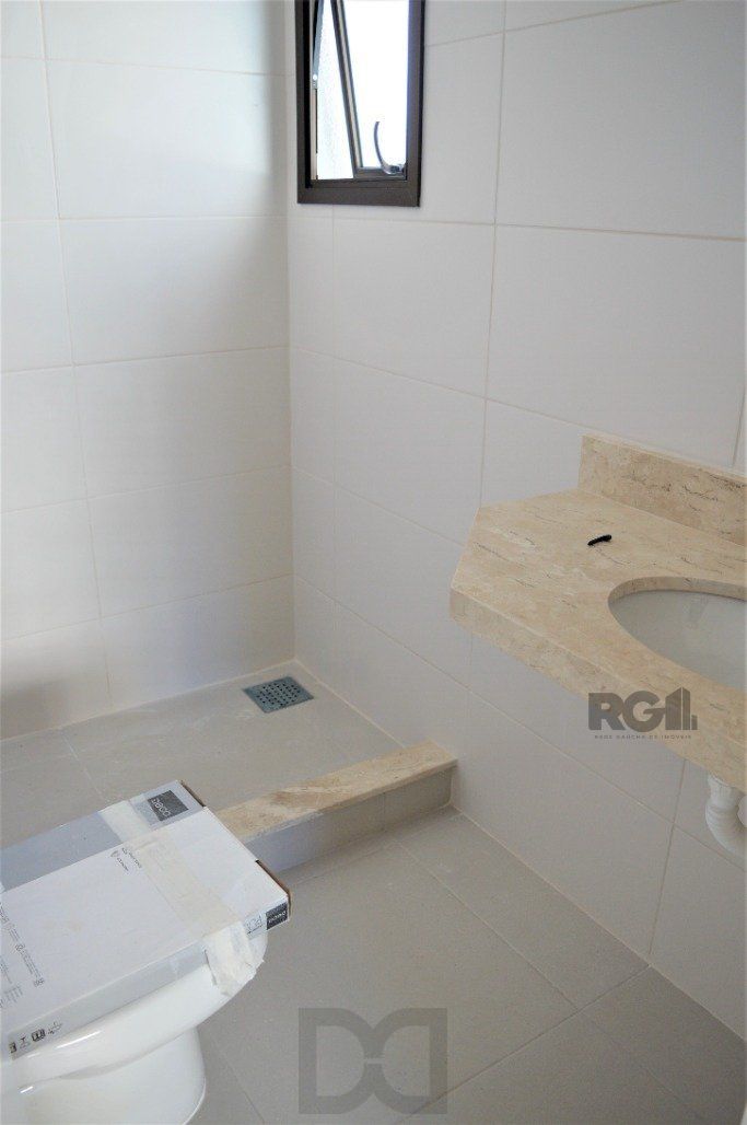 Lindo apartamento 2 dormitórios com 2 suítes, lavabo, vaga de garagem, amplo living 2 ambientes e cozinha com churrasqueira. — foto 37