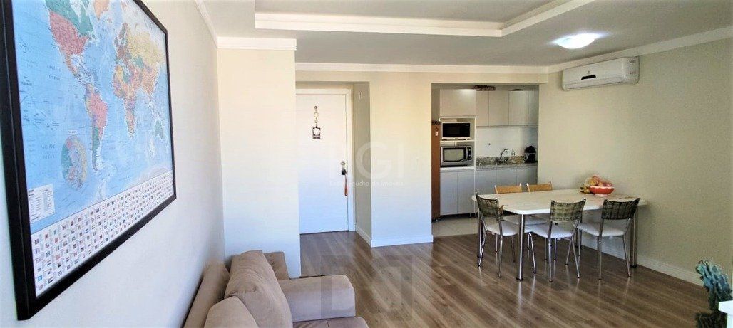 Excelente, amplo e ensolarado apartamento 3 dormitórios sendo 1 suíte, com living 2 ambientes, banheiro social, semimobiliado e com 2 vagas de garagem. — foto 19