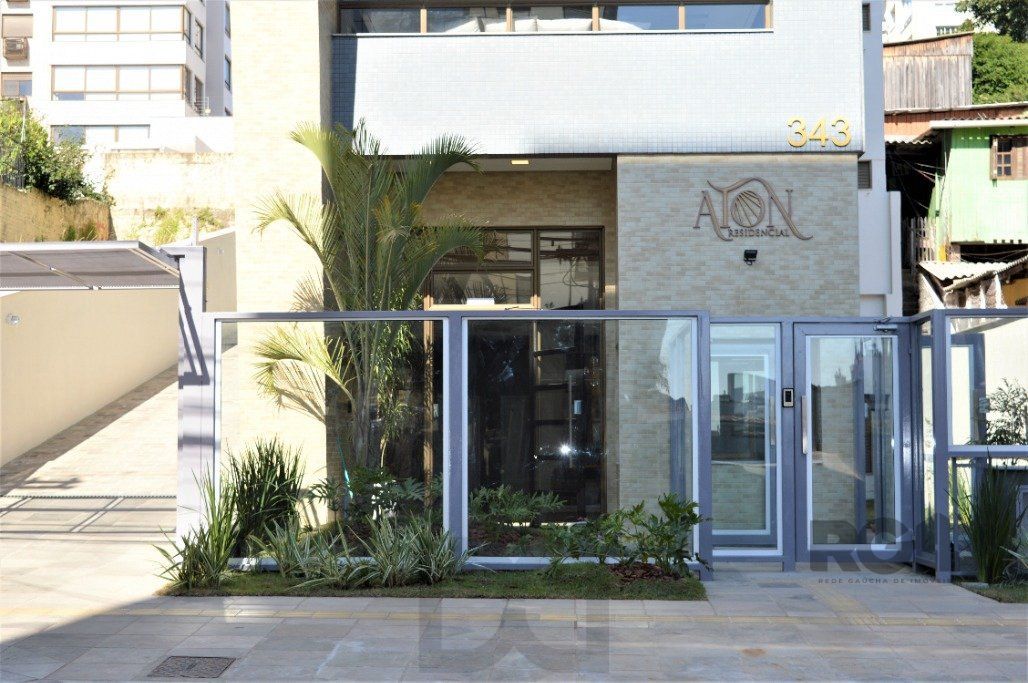 Lindo apartamento 2 dormitórios com 2 suítes, lavabo, vaga de garagem, amplo living 2 ambientes e cozinha com churrasqueira. — foto 4
