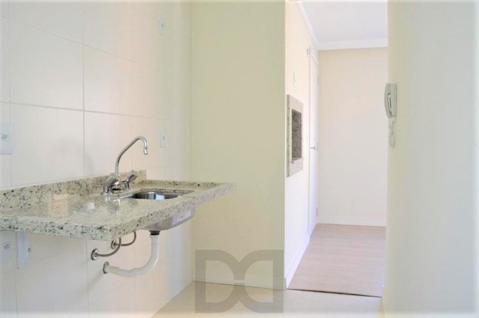 Apartamento 2 dormitórios com 1 suíte e box duplo de garagem no bairro Auxiliadora . — foto 10