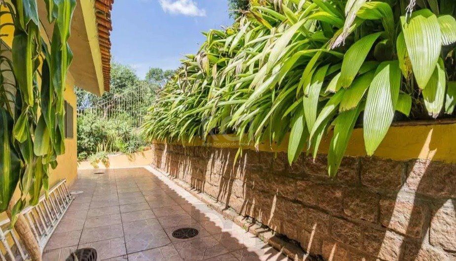 Casa para Venda - 294.4m², 4 dormitórios, sendo 2 suites, 2 vagas - Nonoai — foto 25
