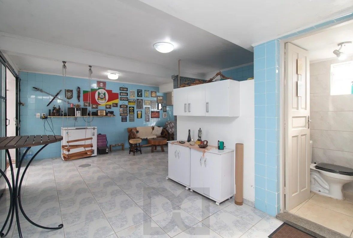Casa com 4 dormitórios e energia solar no bairro Nonoai. — foto 44