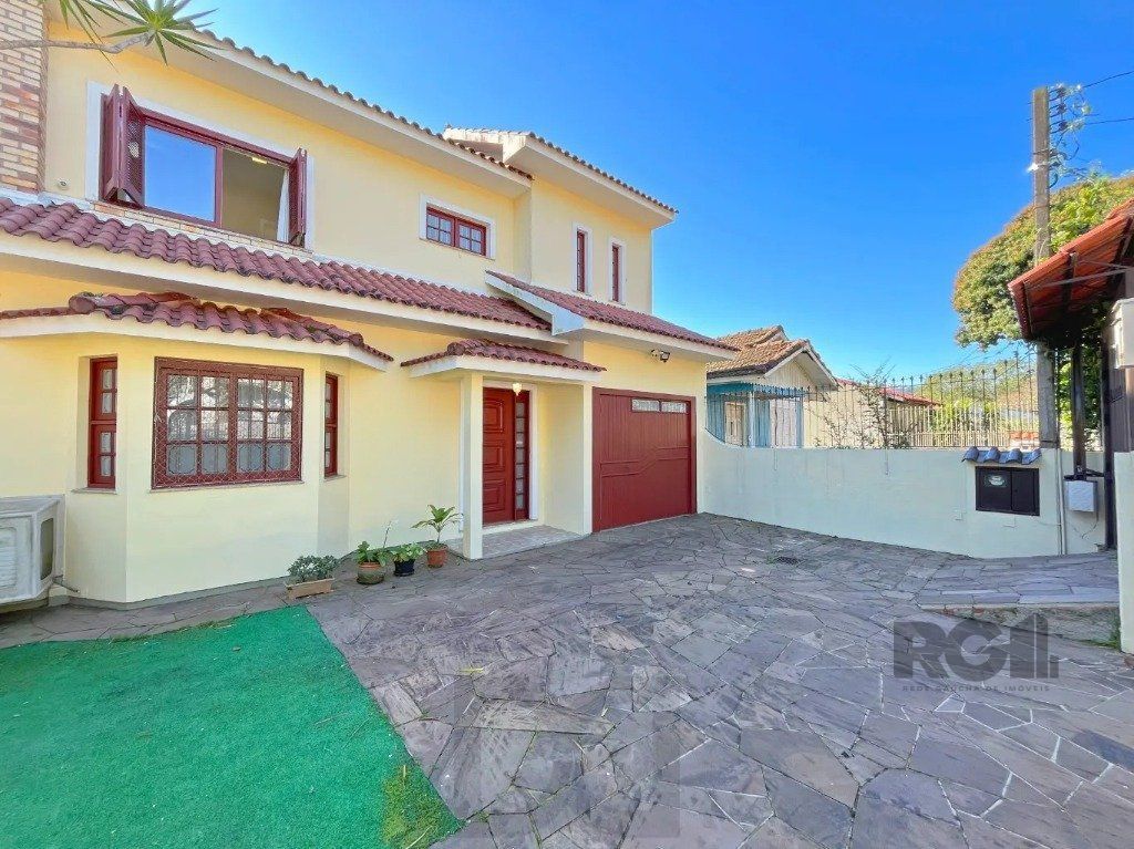 Casa de 3 dormitórios no bairro Cavalhada — foto 1