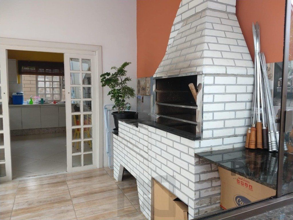 Casa com 3 dormitórios no bairro Ipanema — foto 5