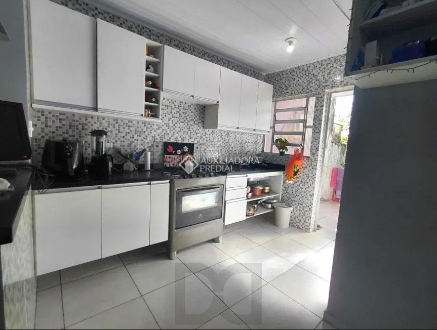 Casa 3 dormitórios no Bairro Coronel Aparício Borges — foto 16