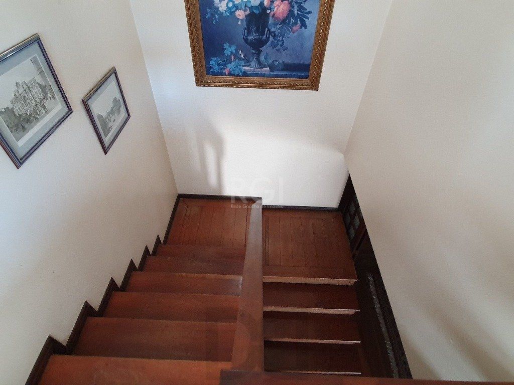 Casa de 333m² com 4 dormitórios, pátio com piscina, espaço gourmet com churrasqueira e 4 vaga de garagem no bairro Passo da Areia — foto 15