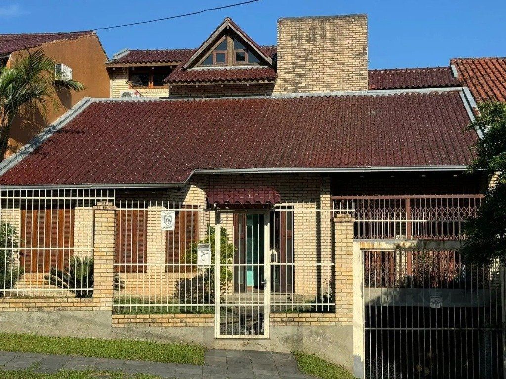 Casa com 4 dormitórios no bairro nonoai — foto 1