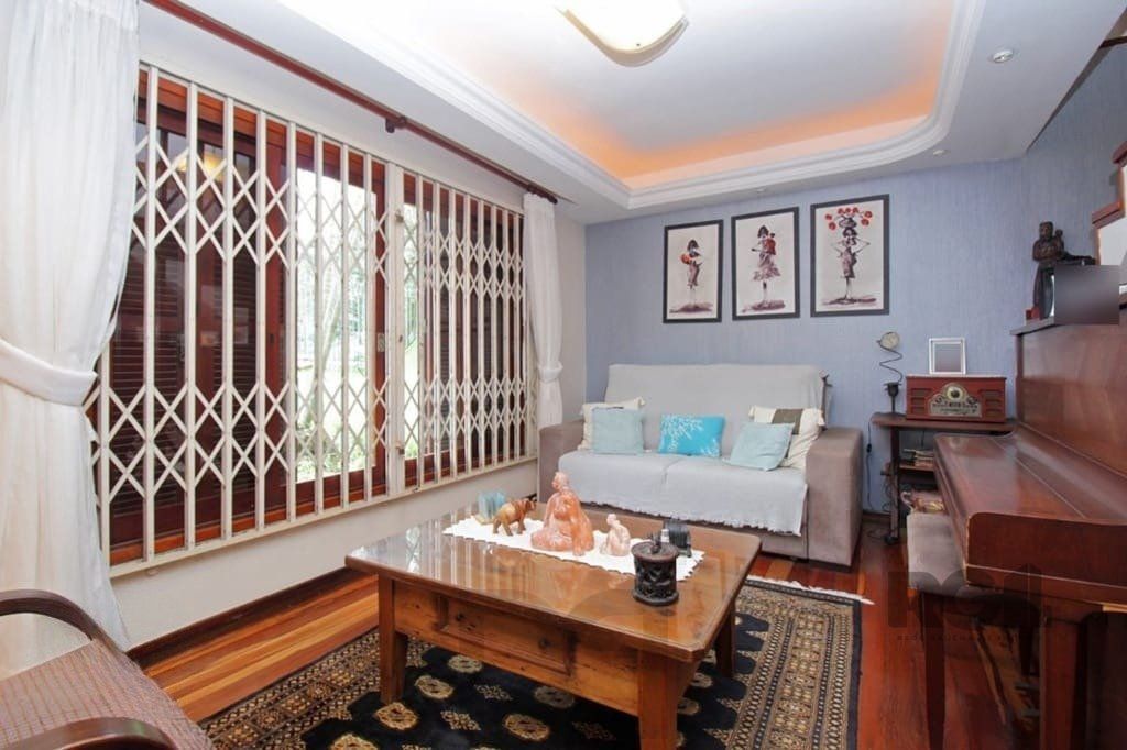 Casa de 275m² - 3 dormitórios e 3 vagas no bairro Coronel Aparício Borges — foto 3