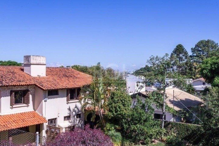 Casa com 03 dormitórios, 01 suíte, pátio, terraço com churrasqueira e vaga de garagem para 03 carros no bairro Ipanema — foto 27